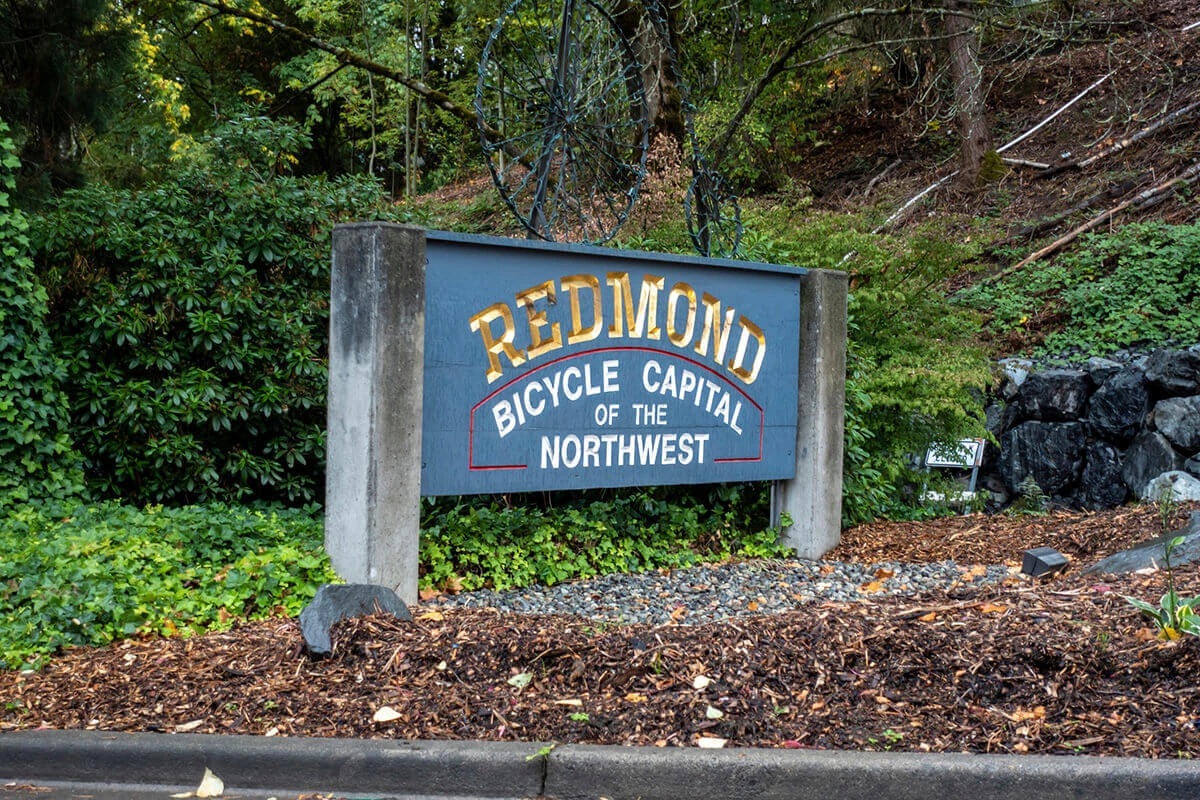 Angled view of the Redmond Bicycle Capital of the Northwest sign near Lake Sammamish