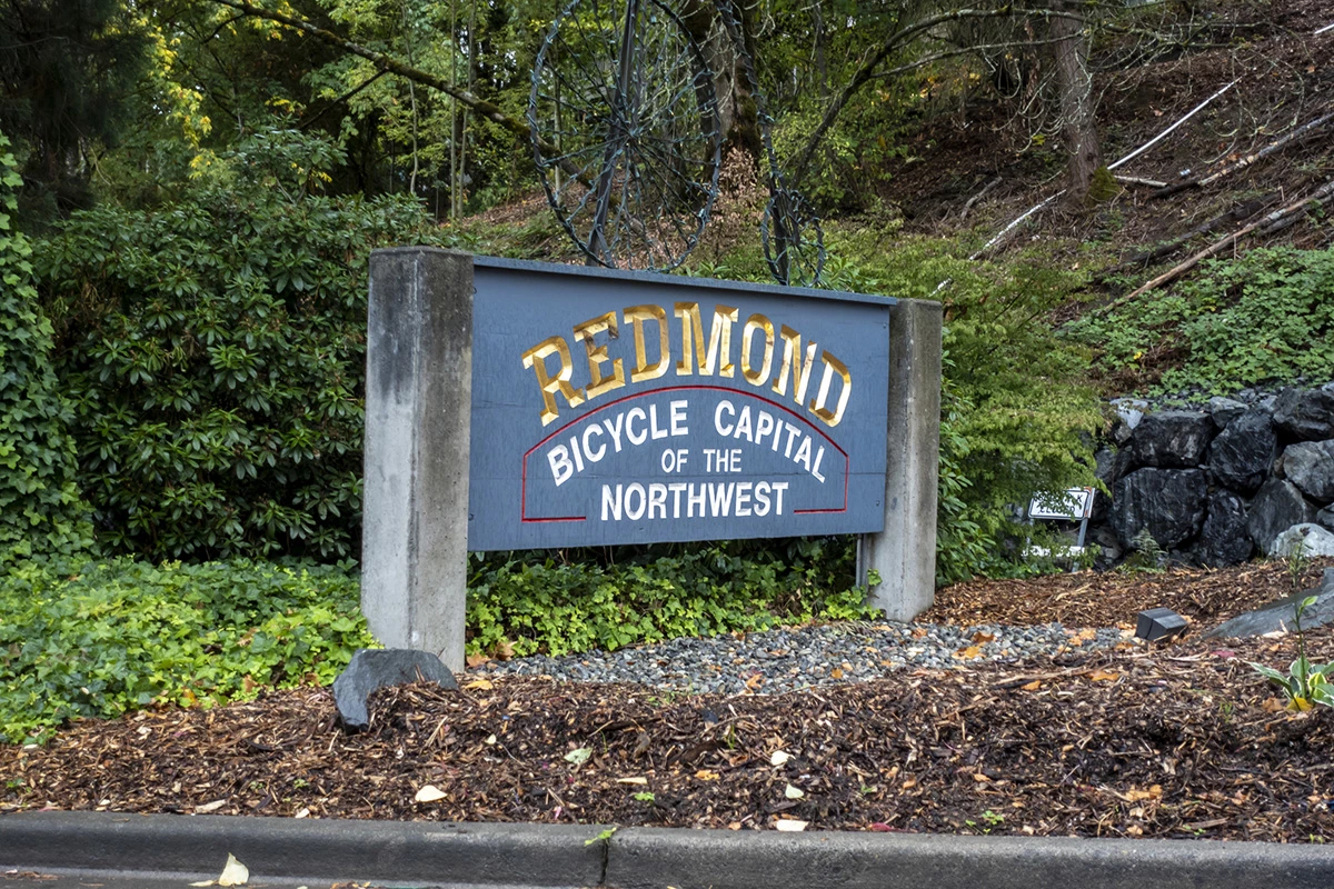 Angled view of the Redmond Bicycle Capital of the Northwest sign near Lake Sammamish