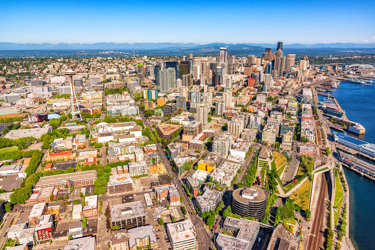 Wide angle aerial view of Seattle, Washington including the Queen Ann and Belltown neighborhoods shot via helicopter from an altitude of about 800 feet