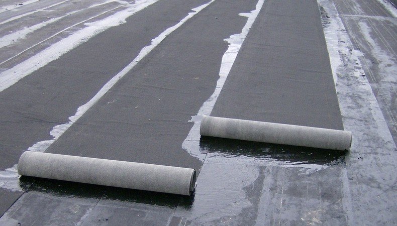 flat roof installation using cold adhesive